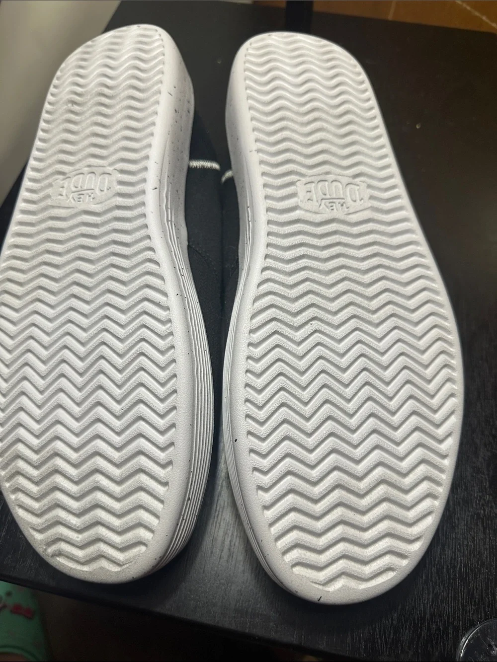 Hey Dude Conway. Black Canvas Slip-Ons with Grey Speckled Sole